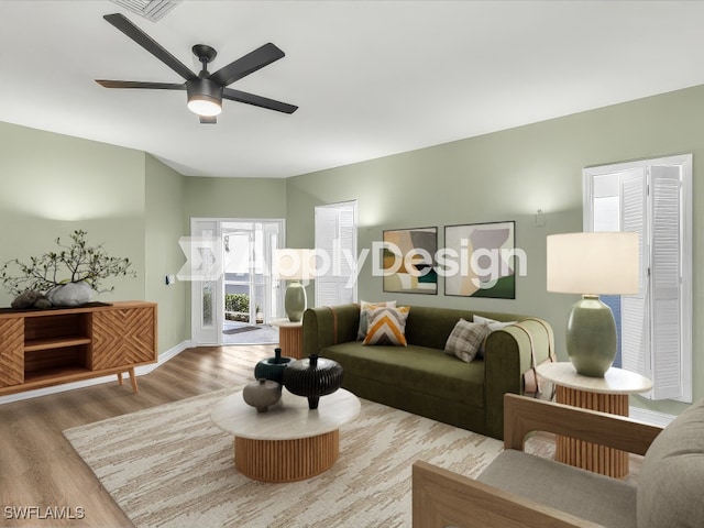 living room with a ceiling fan and wood finished floors