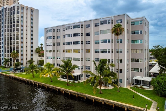 view of building exterior featuring a water view