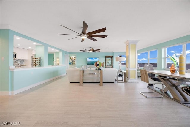 living room featuring ceiling fan