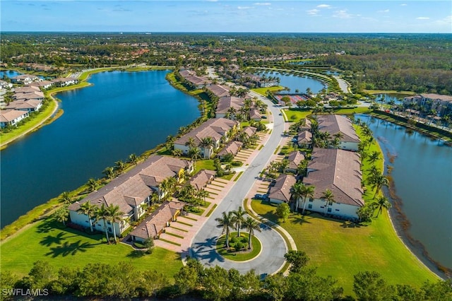 birds eye view of property with a residential view and a water view