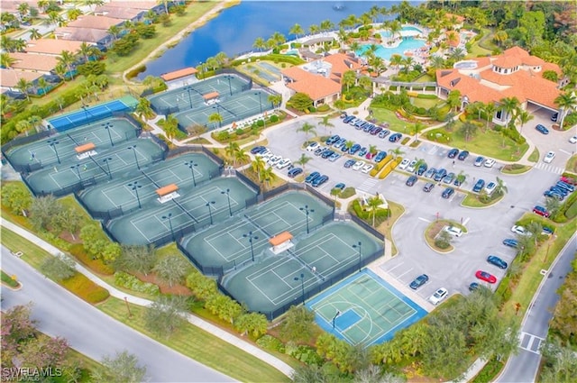 bird's eye view featuring a water view and a residential view