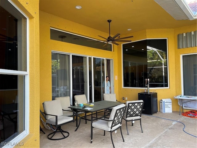 view of patio / terrace with ceiling fan