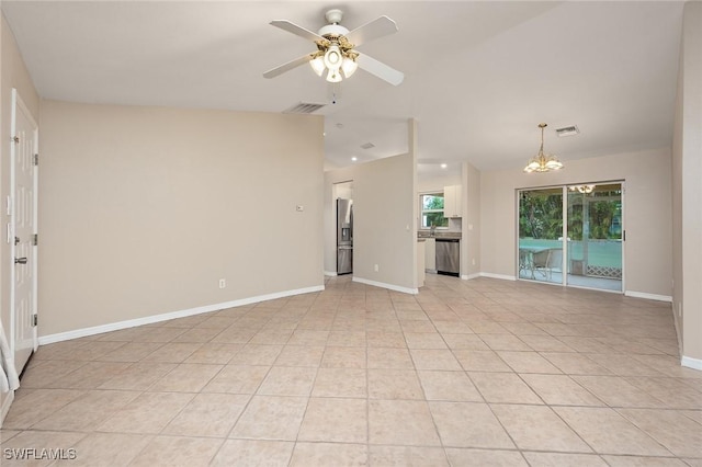 unfurnished living room with light tile patterned floors and ceiling fan with notable chandelier