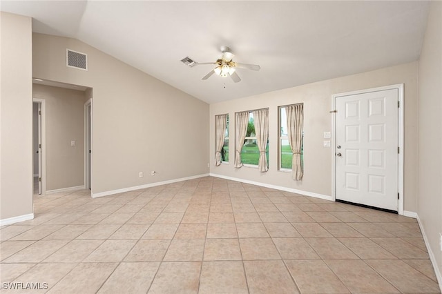 tiled spare room with ceiling fan and lofted ceiling