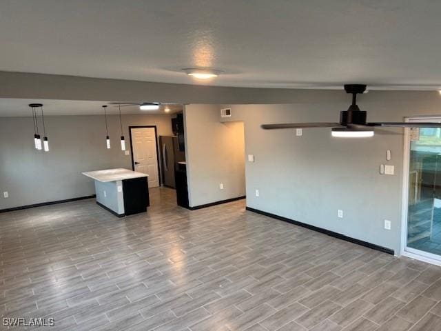 unfurnished living room featuring light hardwood / wood-style floors