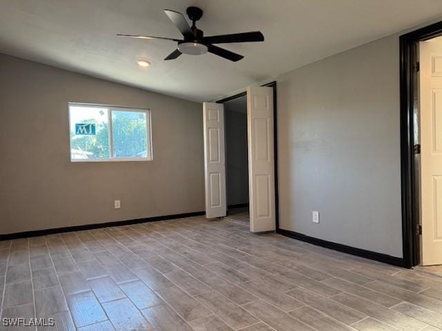 unfurnished bedroom with ceiling fan and light hardwood / wood-style floors