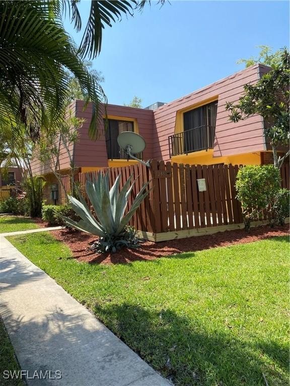 exterior space with a front lawn