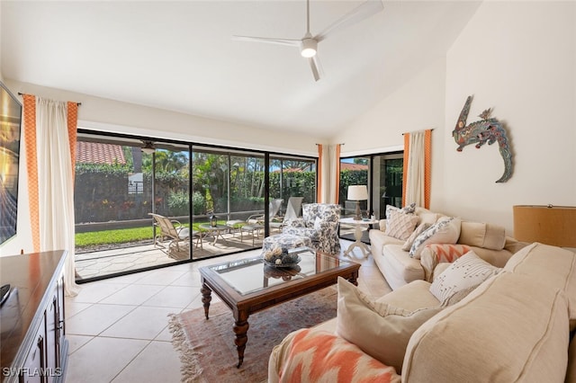 living room with ceiling fan, light tile patterned flooring, and high vaulted ceiling