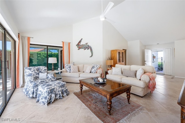 tiled living room featuring high vaulted ceiling, ceiling fan, and a wealth of natural light