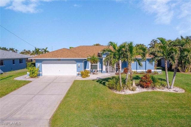 single story home featuring a front yard and a garage