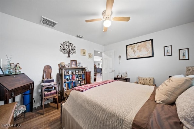 bedroom featuring wood-type flooring and ceiling fan