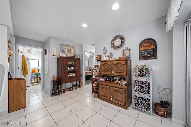 interior space with light tile patterned floors