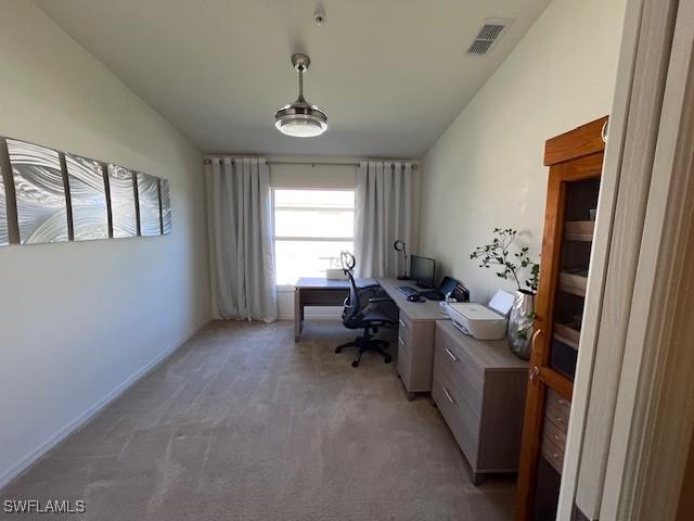 view of carpeted home office