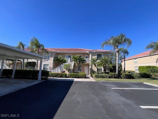 view of property featuring a carport