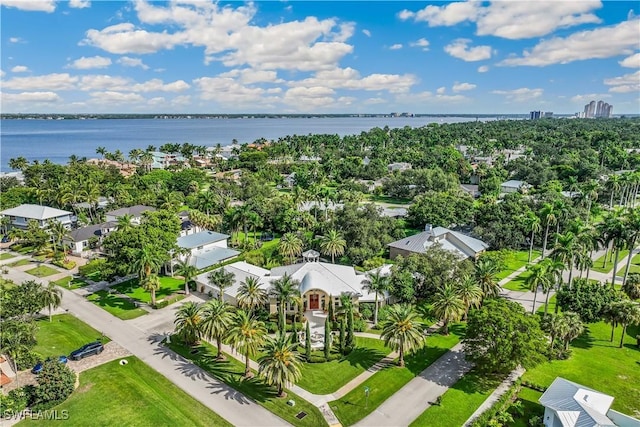 birds eye view of property featuring a water view