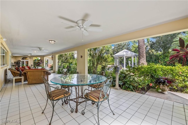 view of patio featuring a gazebo and ceiling fan