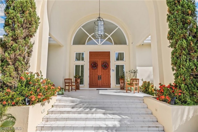 property entrance featuring covered porch