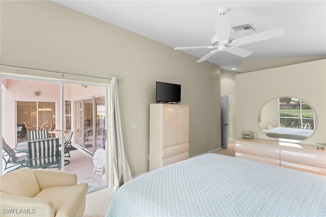 bedroom with ceiling fan, light colored carpet, and lofted ceiling