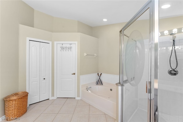 bathroom with plus walk in shower and tile patterned floors