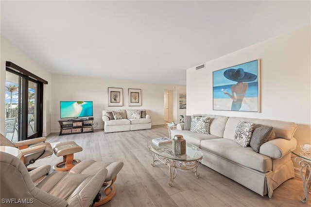 living room featuring light wood-type flooring