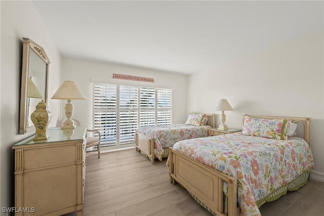 bedroom featuring light wood-type flooring