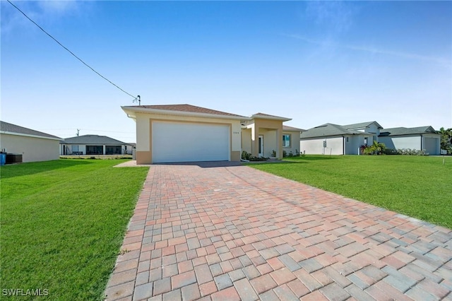 ranch-style home featuring a garage, central air condition unit, and a front yard