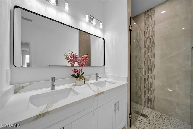 bathroom featuring vanity and walk in shower