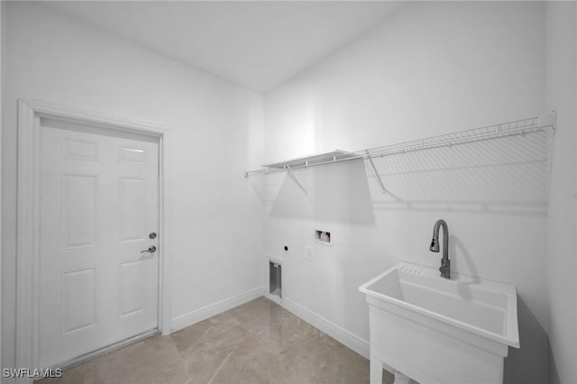 laundry room featuring sink, hookup for a washing machine, and hookup for an electric dryer