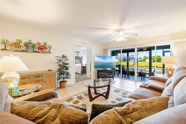 living room with light tile patterned floors and ceiling fan