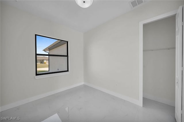 unfurnished bedroom featuring a closet