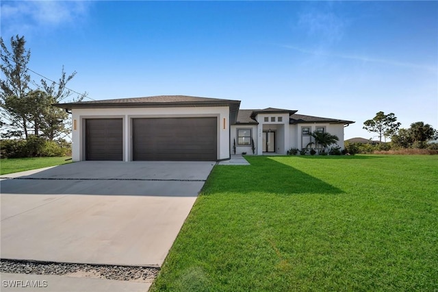 view of front facade with a front lawn and a garage