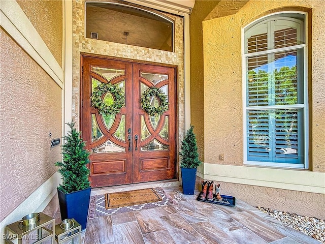 view of exterior entry with french doors