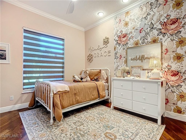 bedroom featuring ceiling fan, dark hardwood / wood-style flooring, and crown molding