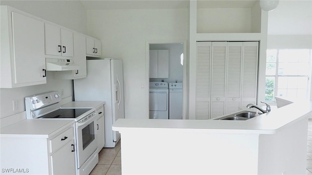 kitchen with white appliances, ventilation hood, sink, separate washer and dryer, and white cabinetry