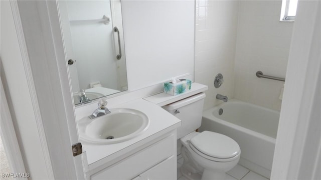 full bathroom with vanity, tile patterned floors, tiled shower / bath combo, and toilet