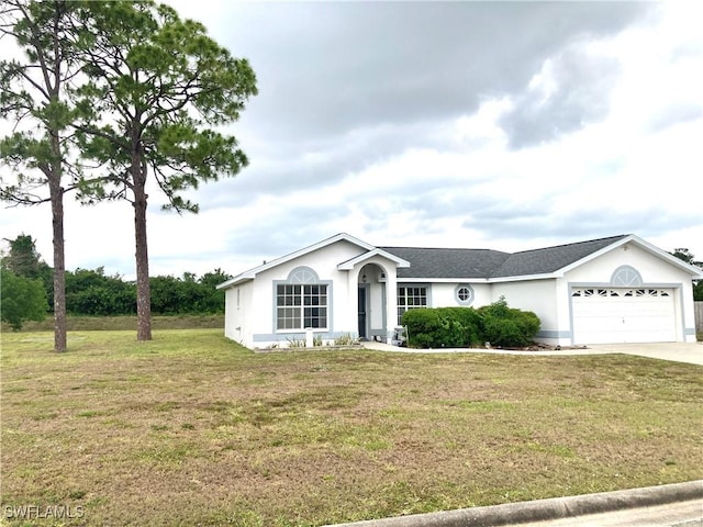 ranch-style house with a garage and a front yard