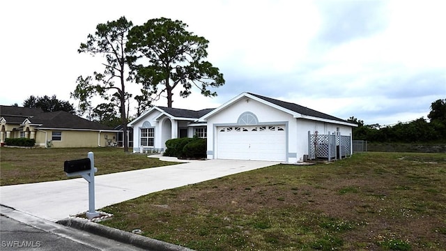 single story home featuring a garage and a front yard