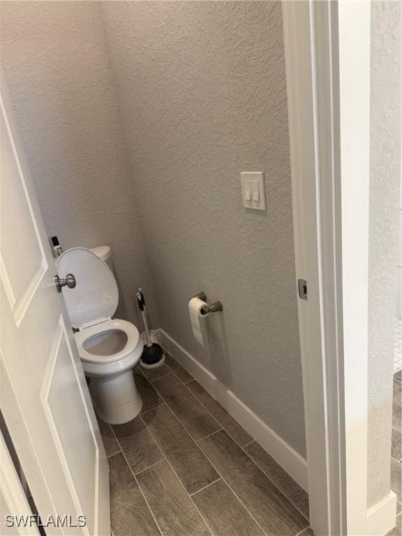 bathroom featuring toilet