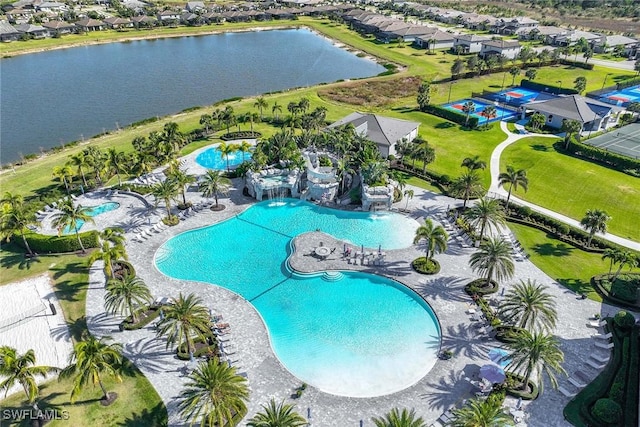 view of pool featuring a water view