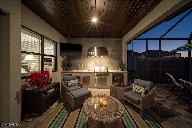 view of patio featuring area for grilling, a lanai, an outdoor living space, sink, and grilling area