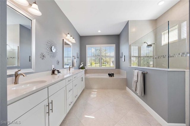 bathroom featuring tile patterned floors, vanity, and independent shower and bath