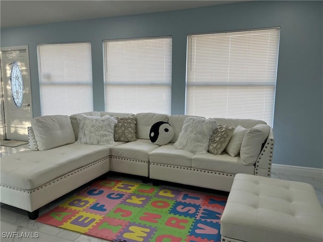 living room featuring plenty of natural light