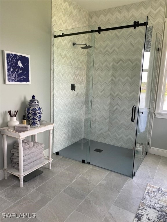 bathroom featuring an enclosed shower