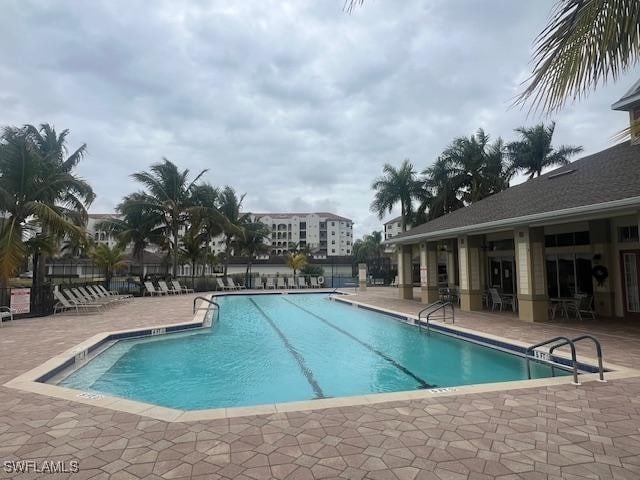 view of pool featuring a patio