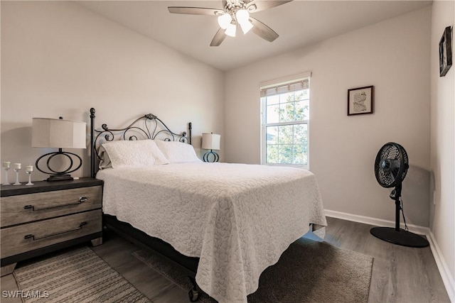 16351 Coconut Palm Dr, Port Charlotte, FL 33953 - bedroom with dark wood-style flooring and ceiling fan