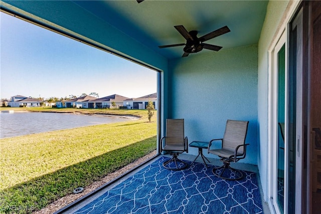 16351 Coconut Palm Dr, Port Charlotte, FL 33953 - view of patio featuring ceiling fan, a water view, and a residential view