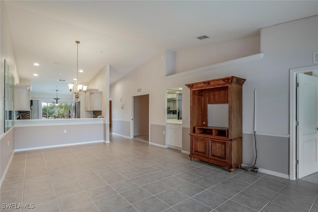 unfurnished living room featuring high vaulted ceiling, light tile patterned floors, visible vents, and a notable chandelier