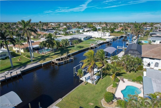 bird's eye view with a water view