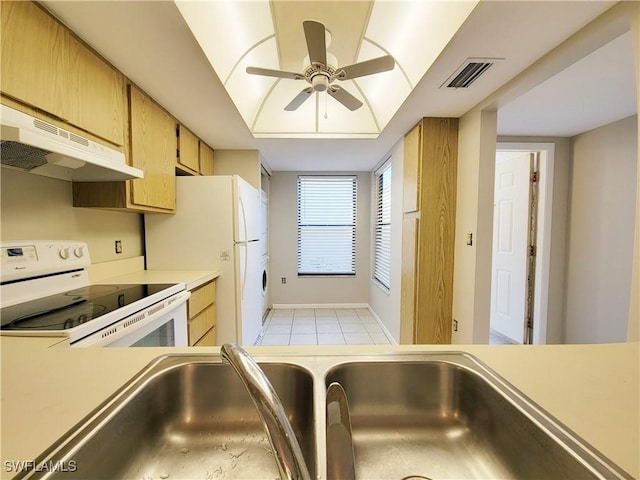 kitchen with white appliances, ceiling fan, light tile patterned flooring, and sink