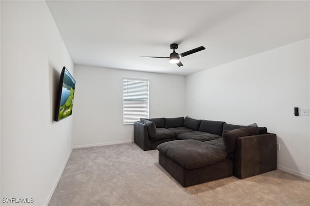 living room with ceiling fan and light carpet